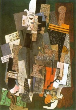 パブロ・ピカソ Painting - 肘掛け椅子に座る山高帽をかぶった男性 1915年 パブロ・ピカソ